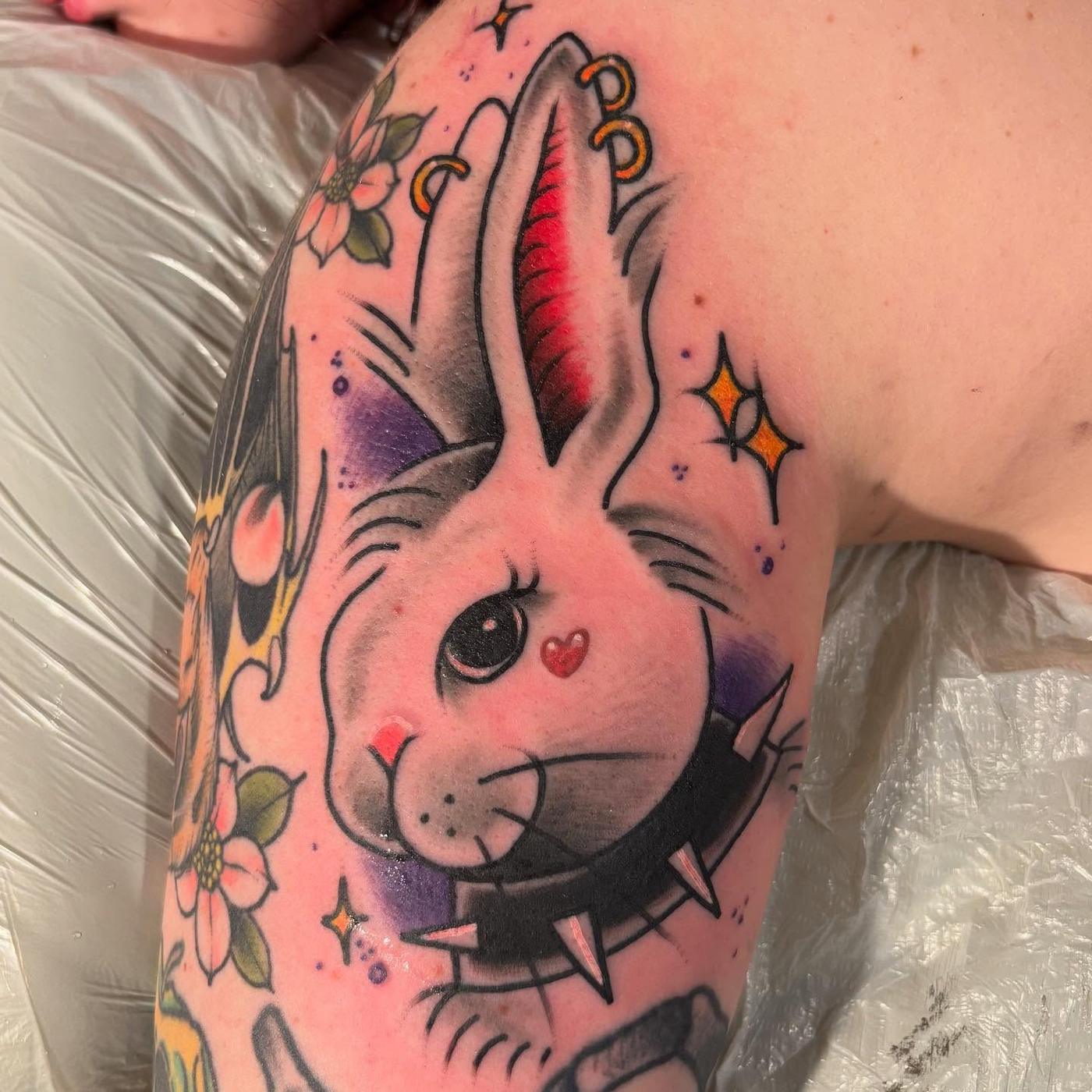 The finished color neo-traditional rabbit tattoo